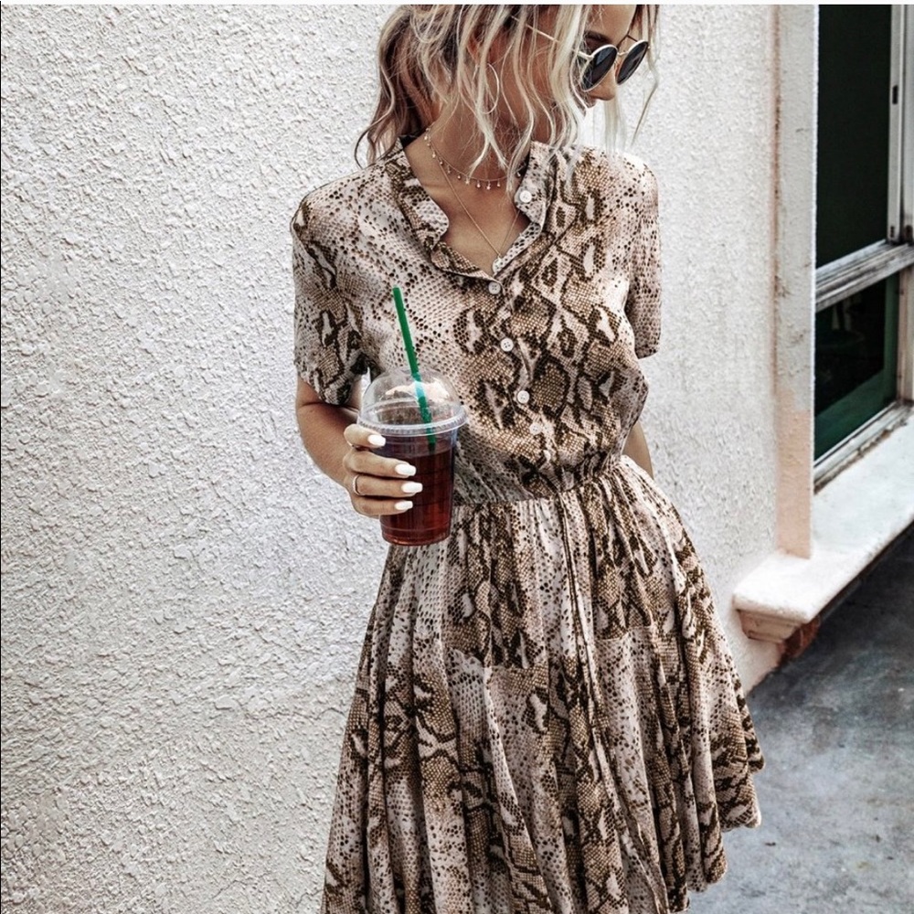20% OFF BUNDLES! HOT AND NEW! Snake print dress.